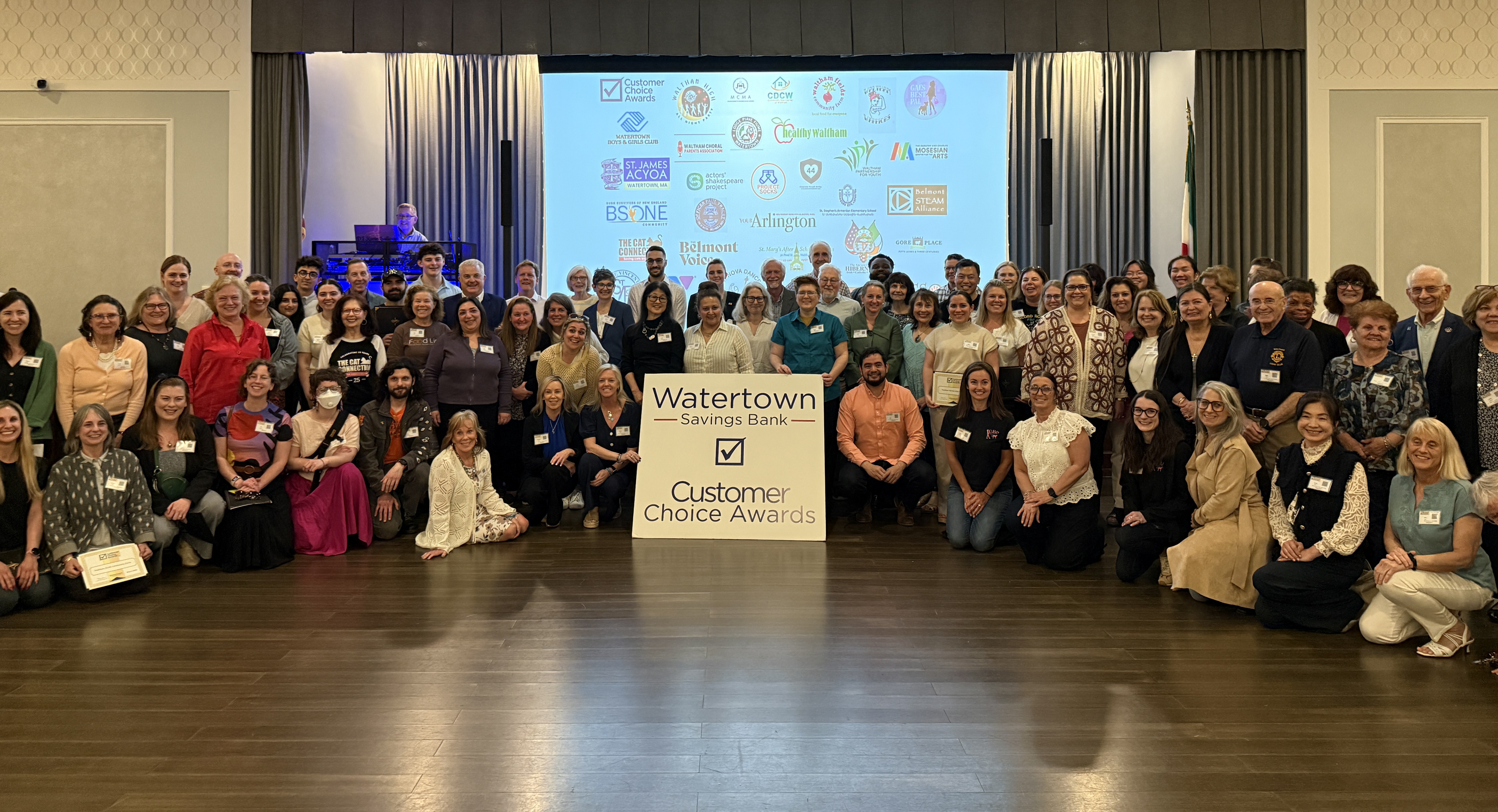 A group picture of all the individuals from various non-profit organizations.