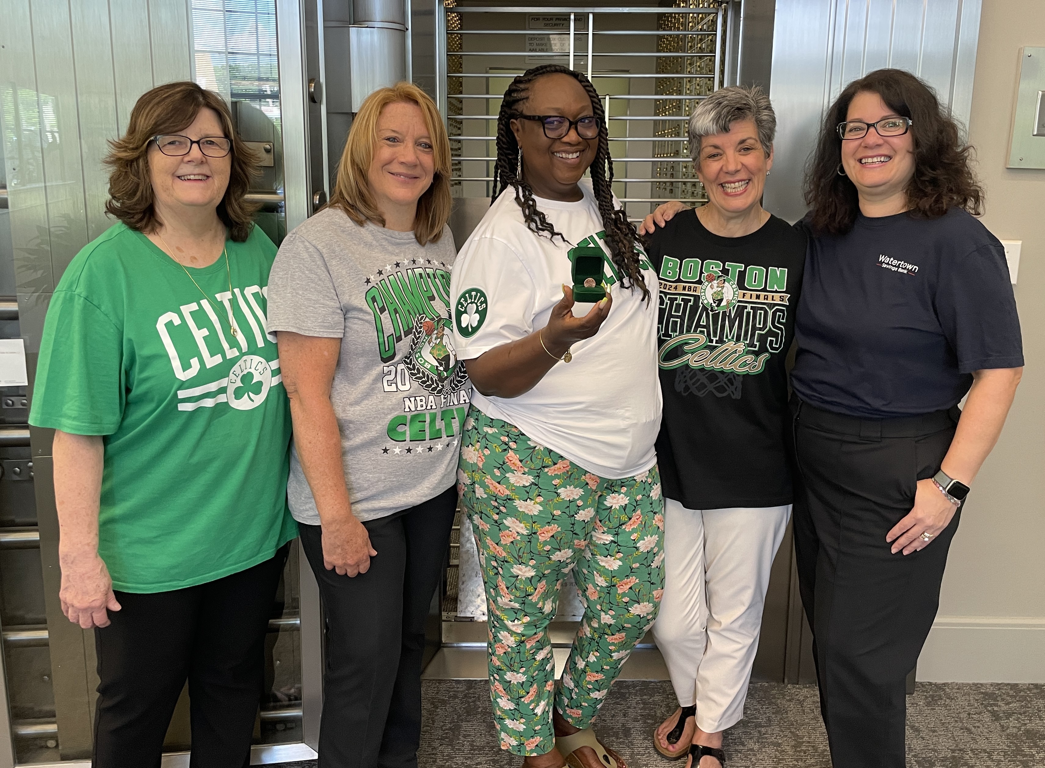 Warrendale Branch Staff in Celtics Gear with 2024 penny