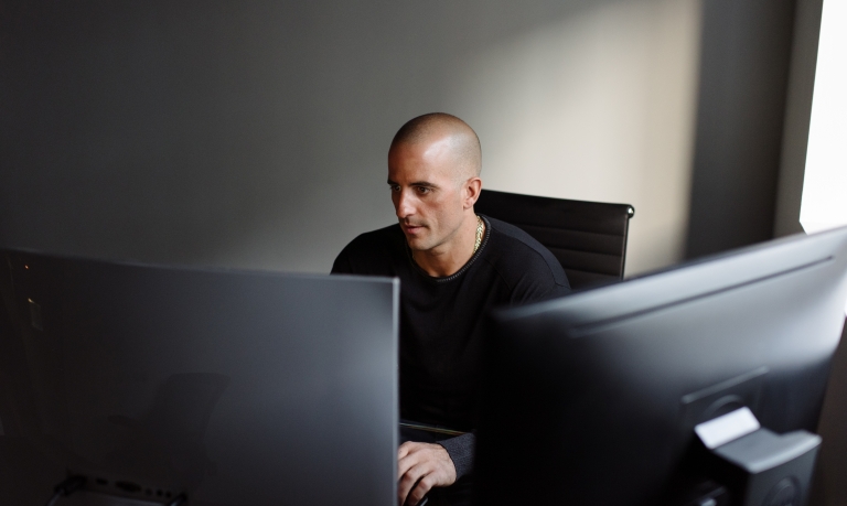 Business customer working on his computer.