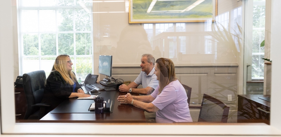 Business customers meeting with a Personal Banker at Watertown Savings Bank.
