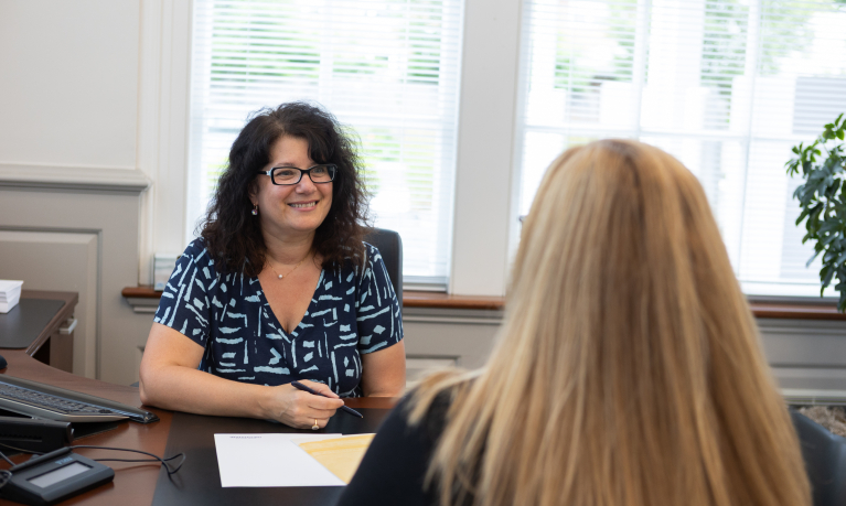 Branch Manager meeting with a business customer.