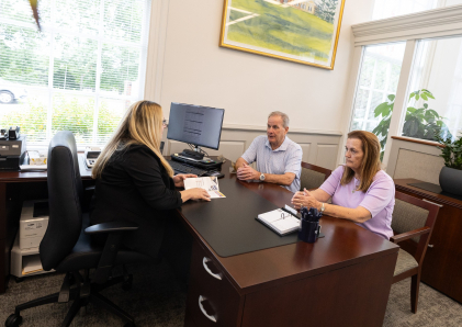 Business customers meeting with a Personal Banker at Watertown Savings Bank.