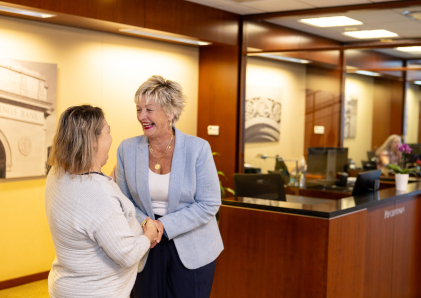 A customer being greeted by WSB's receptionist.