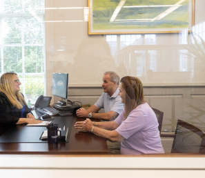 Business customers meeting with a Personal Banker at Watertown Savings Bank.