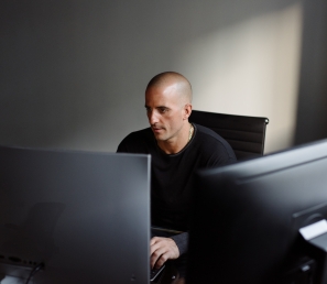 Business customer working on his computer.